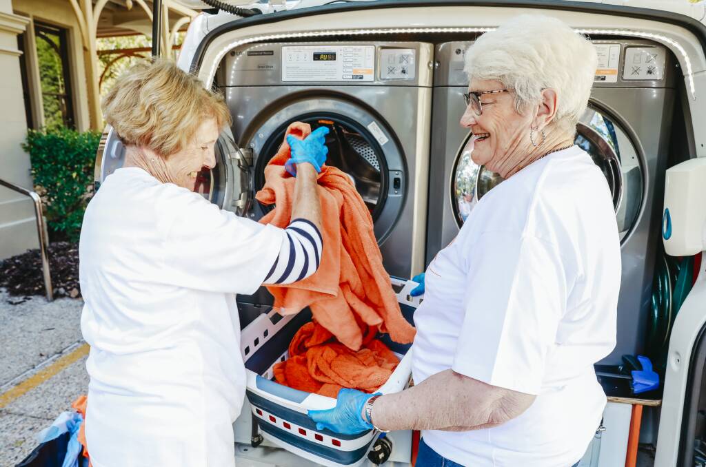 Aveo residents Marylou Eizenberg and Kharyl Scott do the laundry. Picture supplied