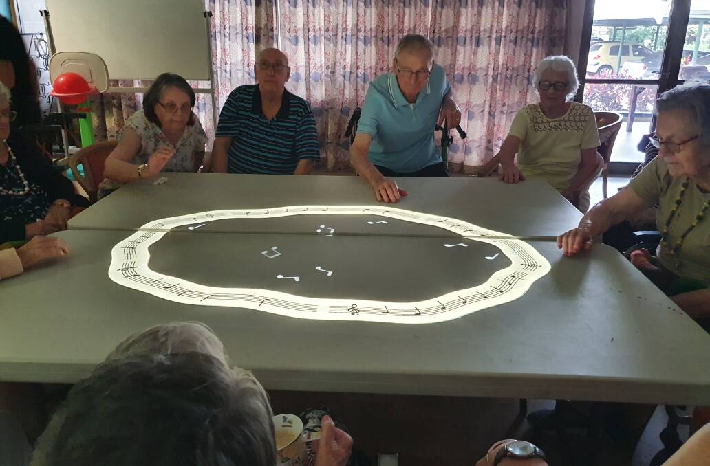 Residents use the Tovertafel, or magic table. Picture supplied