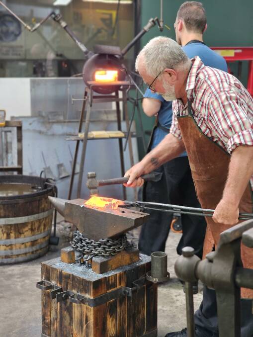 One of the participants learns the art of blacksmithing. Picture supplied