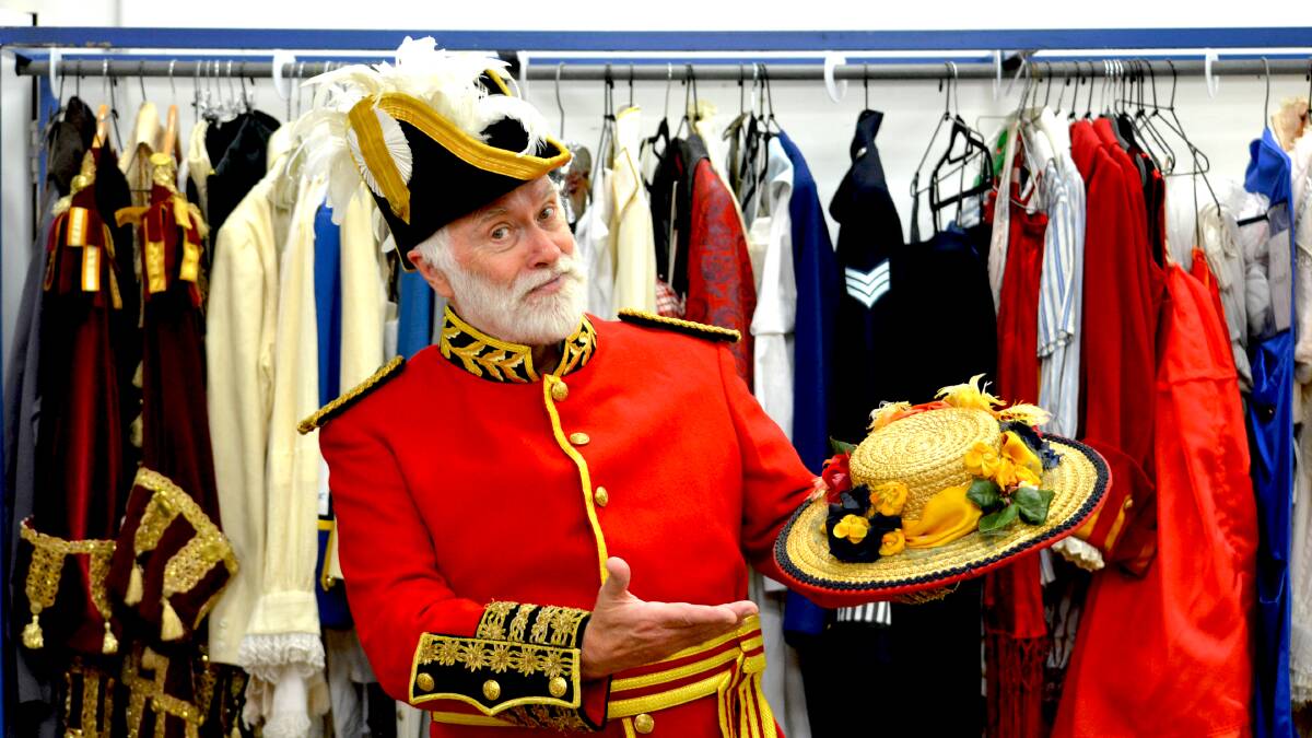 Douglas McNicol is starring as the Major-General in Pirates of Penzance, which is playing in Adelaide this month as part of the Gilbert & Sullivan Festival. He is pictured perusing costumes for the shows at the State Opera South Australia headquarters at Netley. Picture by Anthony Caggiano