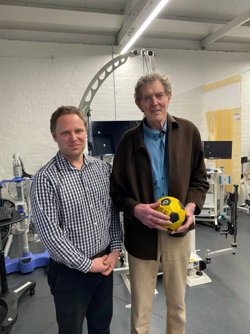 Physiotherapist and UniSA researcher, Dr Brenton Hordacre with university's stroke bootcamp participant Adrian Fitzgerald. Picture supplied