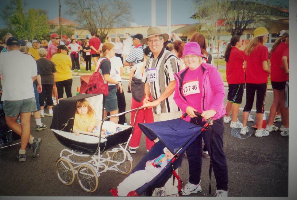 Rodney and Mary Ann Biggs at the 2003 City to Bay Fun Run with their grandchildren Asha and Indigo. Picture supplied