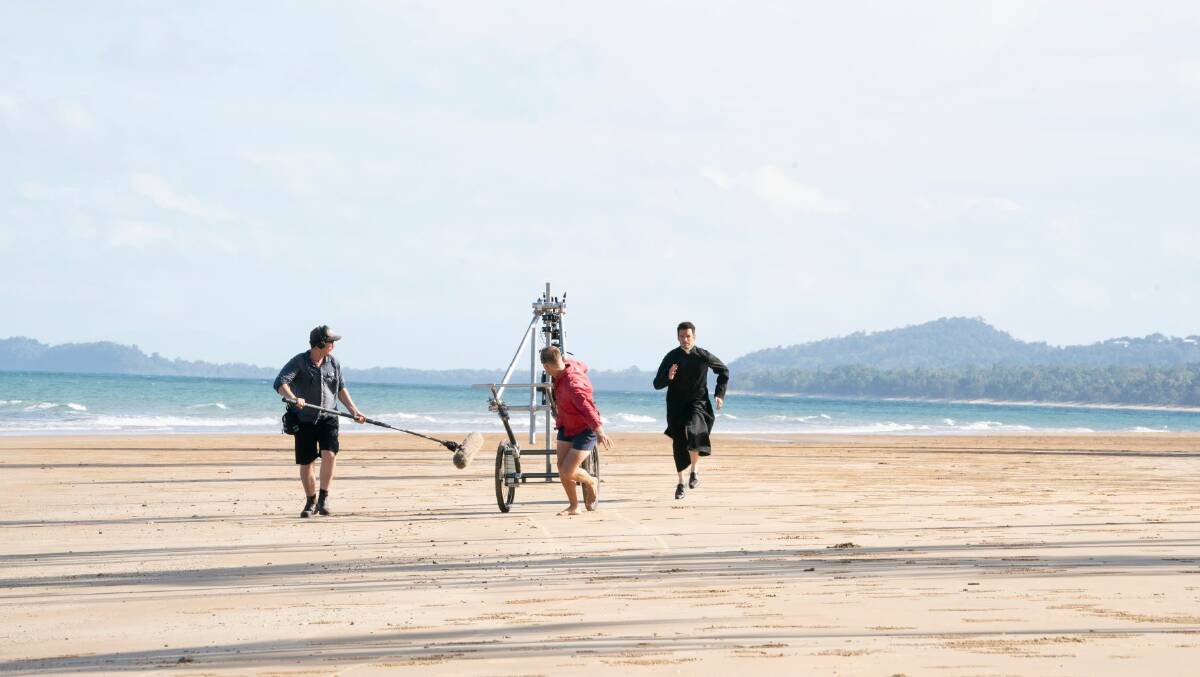 Mack Running is seen running along Mission Beach in a behind the scenes shoot of 'Irreverent'. Picture by Screen Queensland