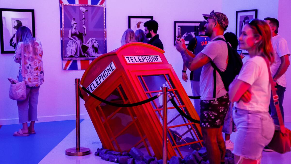 The sculpture Phone Booth is one of 150 articles displayed in a Rundle Mall, Adelaide exhibition of British artist Banksy's work. Picture supplied