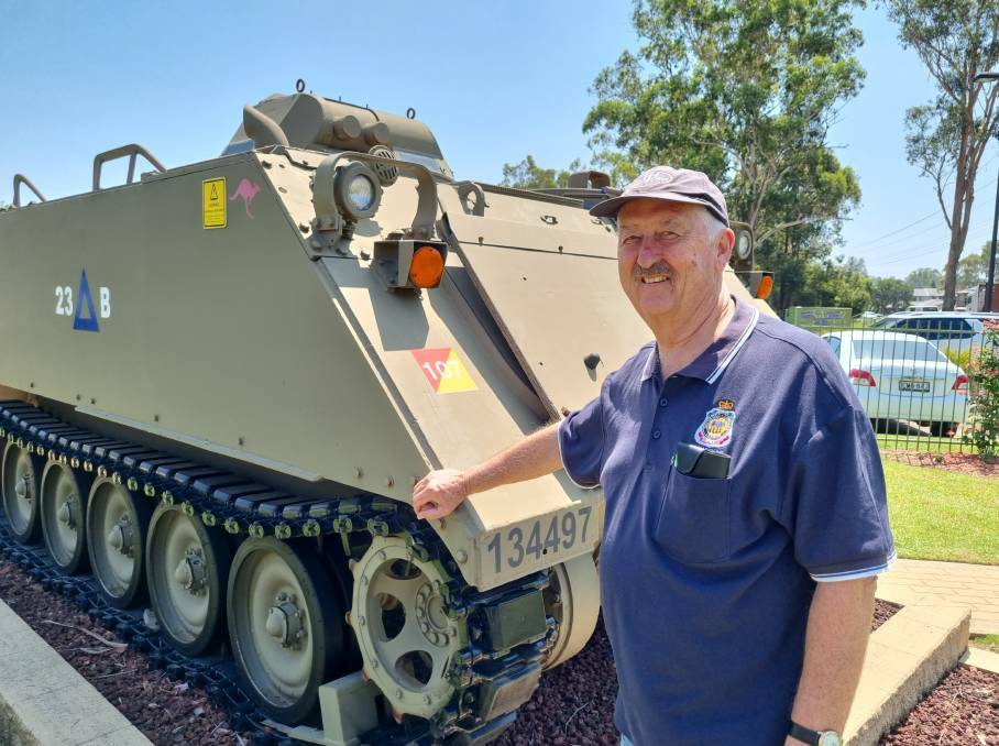 Tony Fryer, honorary secretary of the St Mary's RSL Sub-Branch, with an armoured personnel carrier like the one he commanded in Vietnam.