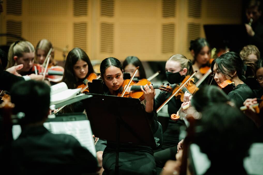 The Adelaide Youth Orchestra playing violins. Picture supplied