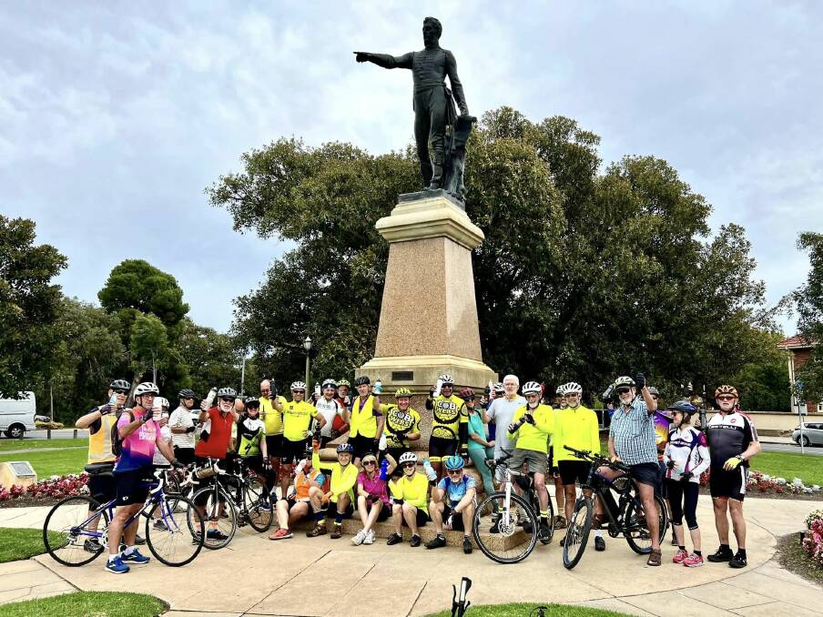 Ride with Keith participants at the Colonel William Light statue at Pinky Flat, Adelaide. Picture supplied