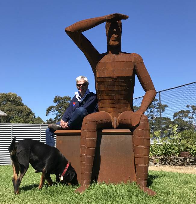 The owner of Paul Dimmer's work Lookout and his dog. They live on a hill and the piece looks out over the ocean. Picture supplied