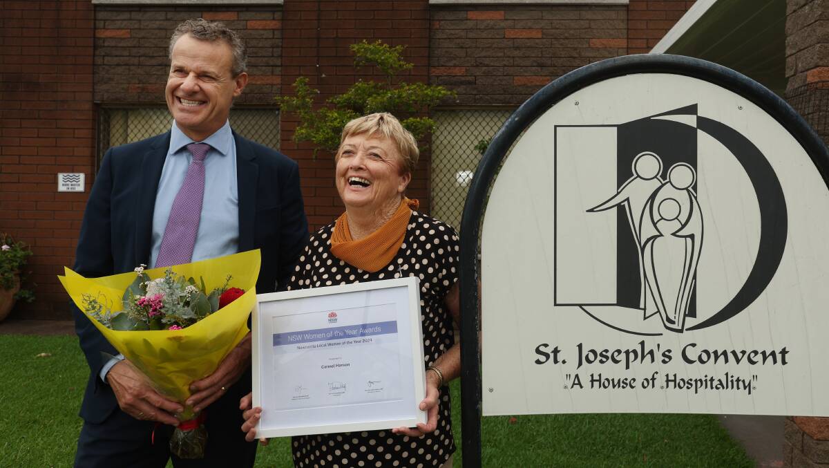 Member for Newcastle Tim Crakanthorp awarded House of Hospitality founder and coordinator Sister Carmel Hanson RSJ Newcastle Woman of the Year. Picture Simone De Peak
