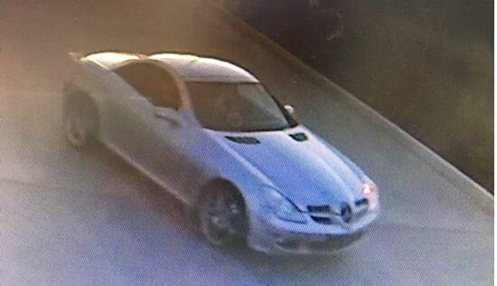 Detectives say the two men were travelling in a car that appears to be a silver Mercedes Benz SLK350. 