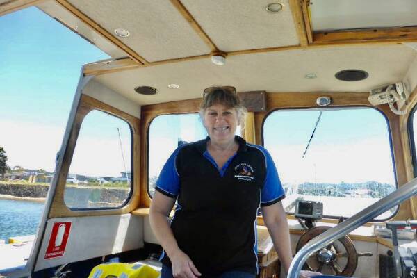 River cruise operator Kim Phillips-Haines aboard her Just Leven ferry at Ulverstone. Picture supplied.