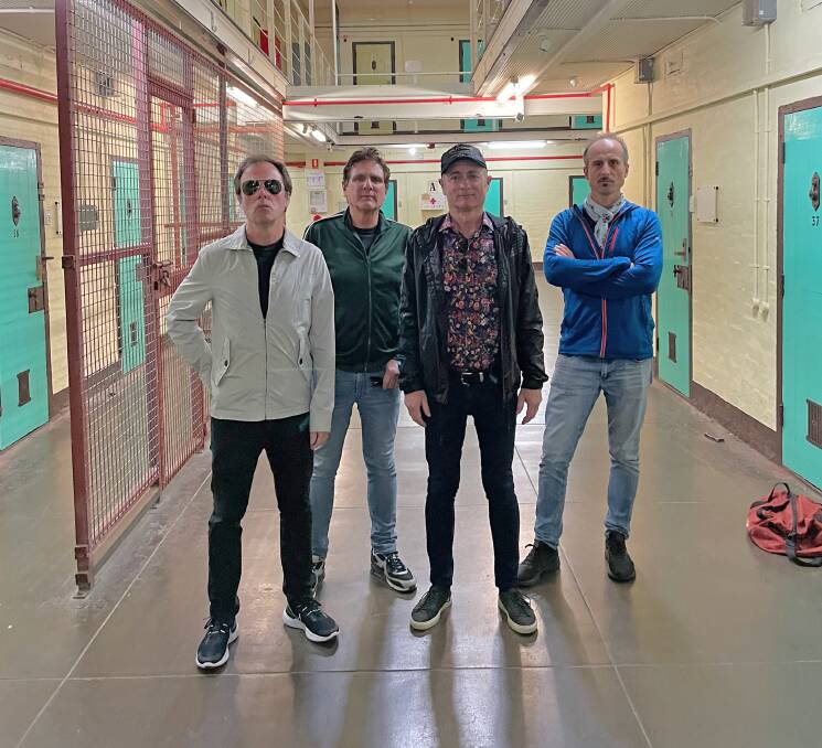 Dave Faulkner (second from right) with Hoodoo Gurus bandmates at Freo Gaol. Picture supplied