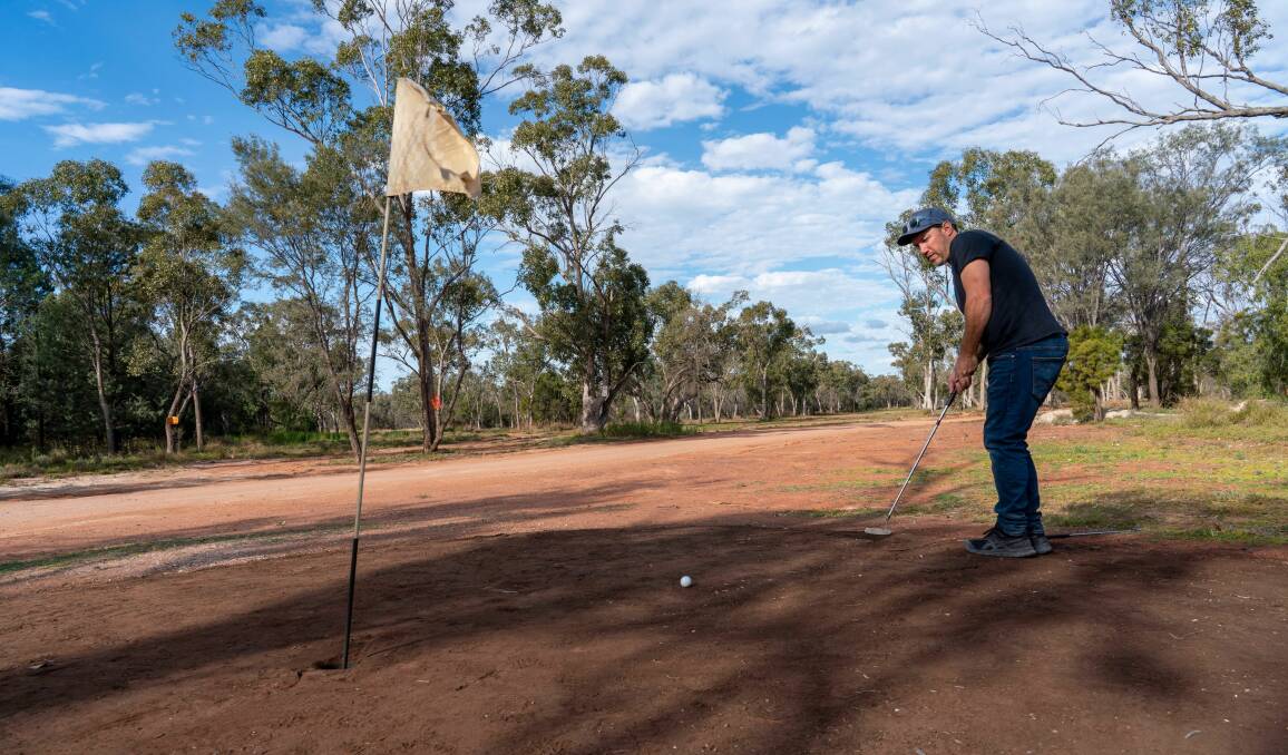 Enjoy a spot of golf in the outback town. Picture courtesy of Destination NSW