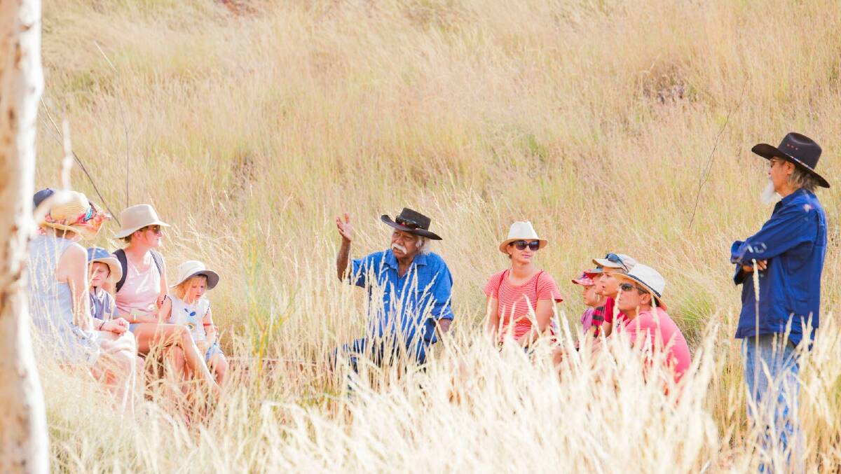 Banjima elder Maitland Parker with visitors in the Karijini National Park. Picture supplied