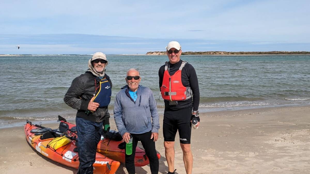 Kenny Stephens flanked by Phillip Pearce (left) and Iain Mason at the Murray mouth. Picture by Mark Mussared
