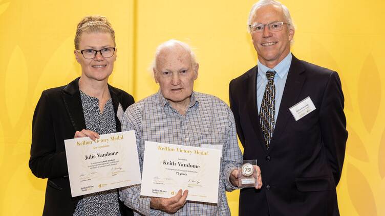 Keith Vandome with his oldest daughter Julie Vandome and Diabetes Victoria president Richard Loveridge at the medal presentation in November. Picture supplied 