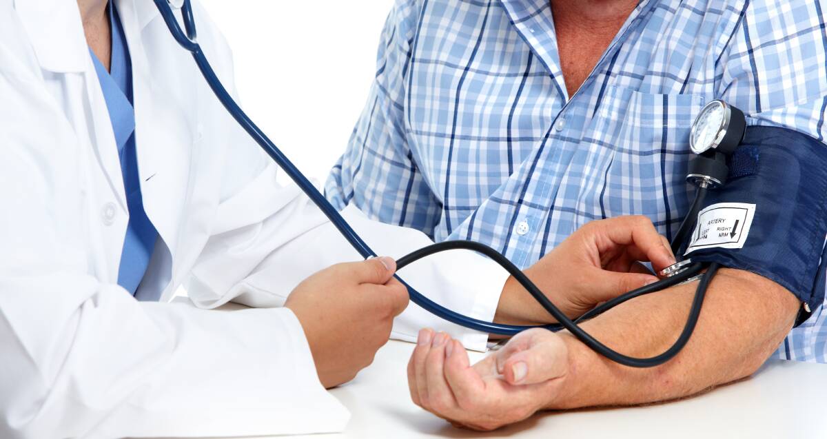 A senior has his blood pressure checked. Picture Shutterstock