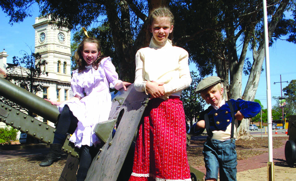 THAT WAS THEN – Local youngsters evoke fashions past at Guildford’s Stirling Park. Photo: Hazel Johnson