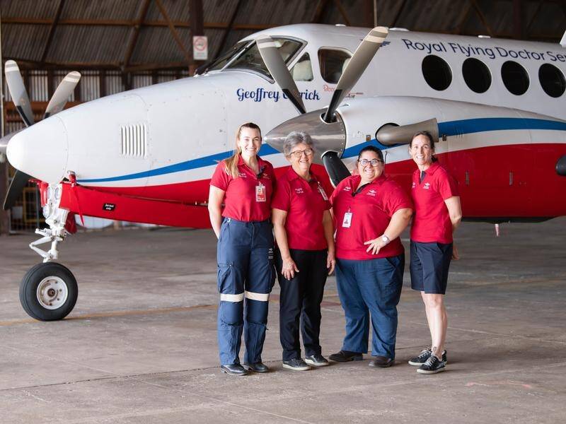 RFDS Charleville nurse manager Joanne Mahony (right) has been taking to the skies for two decades. (HANDOUT/RFDS)