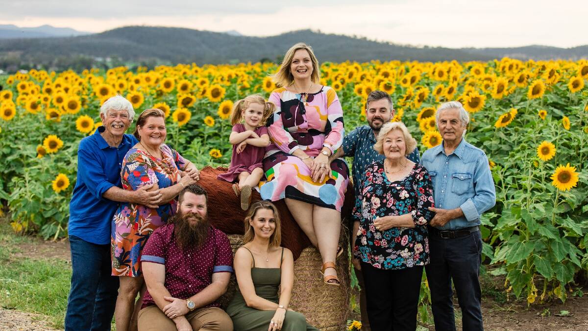 Sunflowers bring smiles to the faces of all the family. Picture Dallas Love Photography